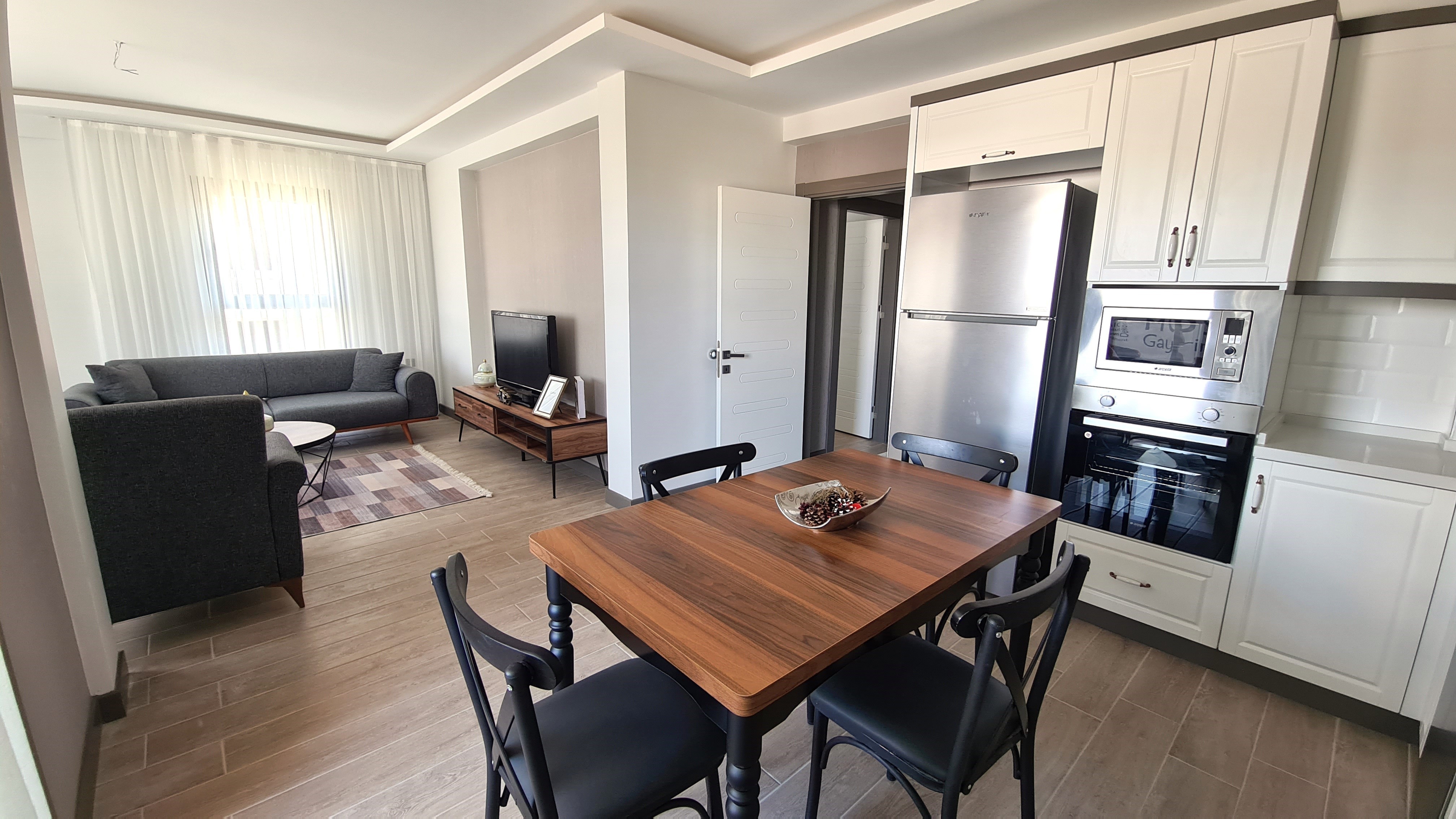 Appartement moderne entièrement meublé à vendre dans le quartier de Değirmendere, Kuşadası